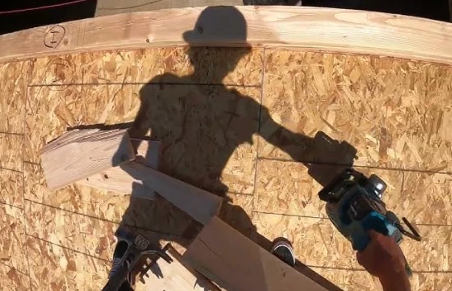 First-person view of framing work on a construction site